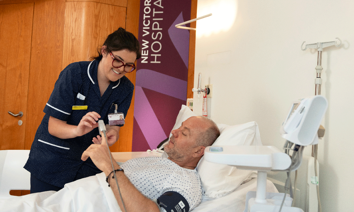 A ward patient having blood pressure monitored