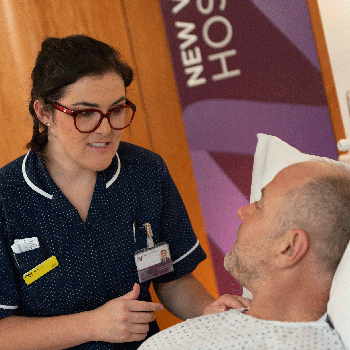 Nurse with a ward patient