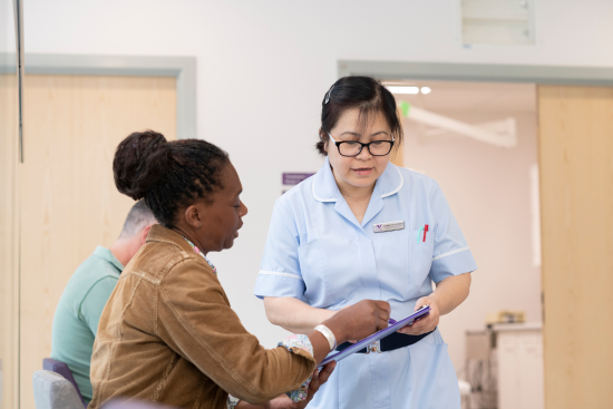 Patient and nurse in the reception