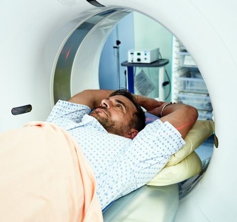 Patient laying in medical imaging device